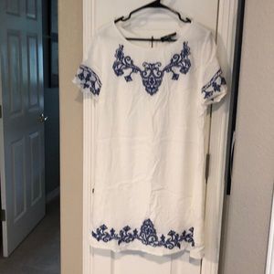 Cream and blue dress.